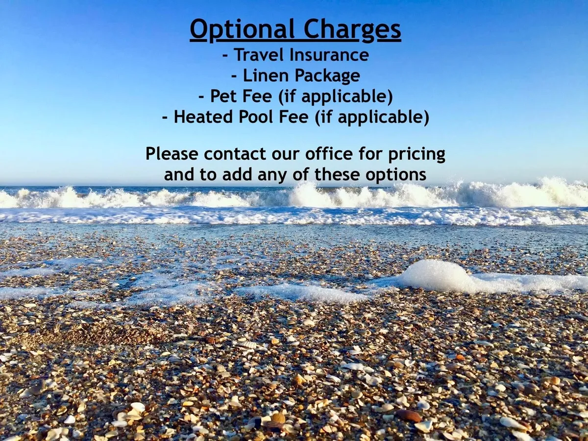 A serene scene of the beachfront with gentle waves crashing onto the sand, scattered seashells, and an inviting shoreline stretching into the distance. The atmosphere is tranquil and open, suggesting opportunities for long walks and sunset strolls.